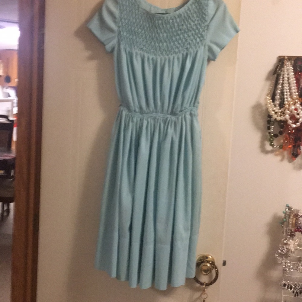 Woman’s handmade smocked dress
